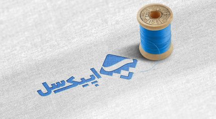 موکاپ لوگو دوخت شده روی پارچه بهمراه قرقره نخ