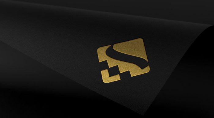 موکاپ لوگو طلایی روی برگه مشکی مات